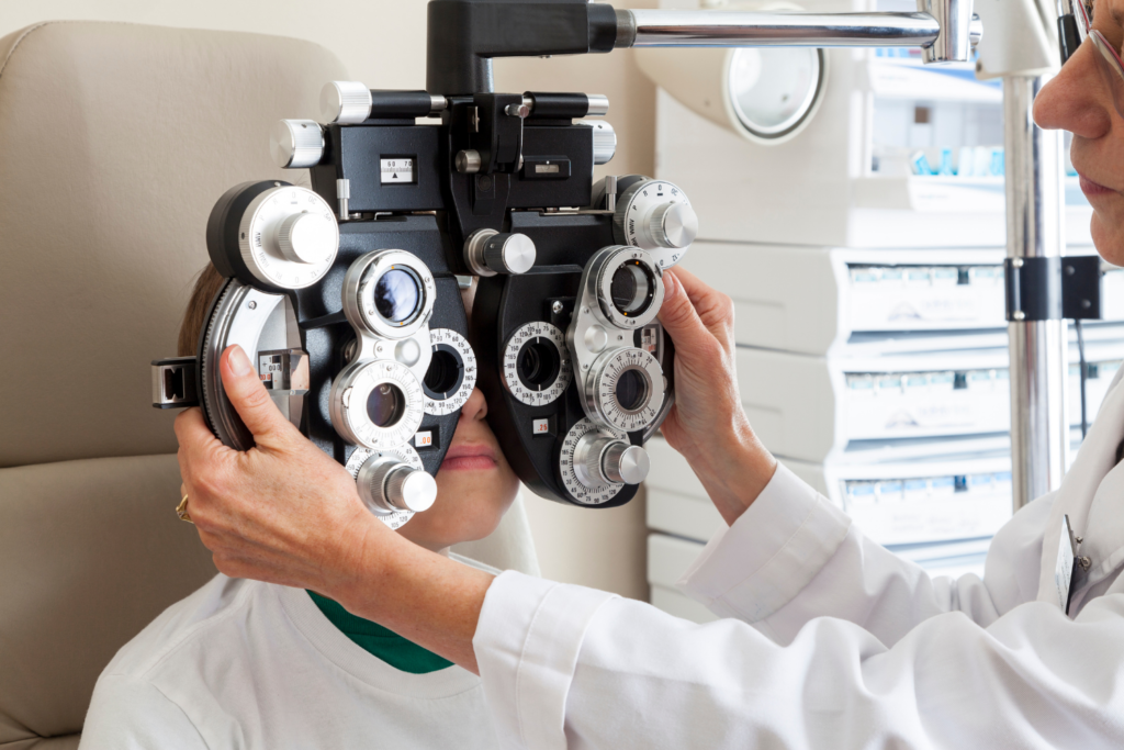 vision testing using advanced refraction equipment during a comprehensive eye exam.