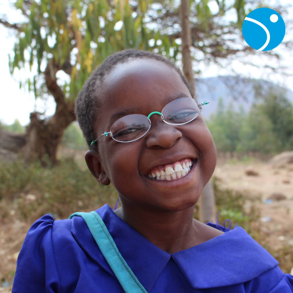 Child wearing pair of glasses, provided by Good Vision USA.