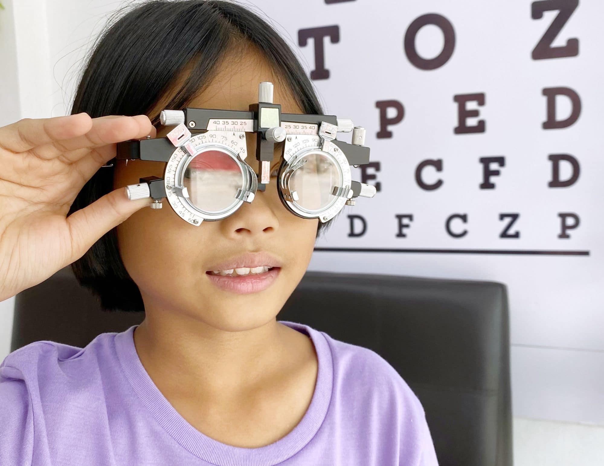 Girl getting an annual eye exam at Mango Optic in Boca Raton.