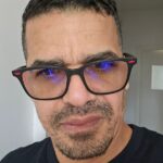 Man wearing glasses from Mango Optic in Boca Raton.