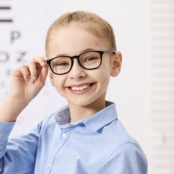 Girl wearing glasses at Mango Optic in Boca Raton.